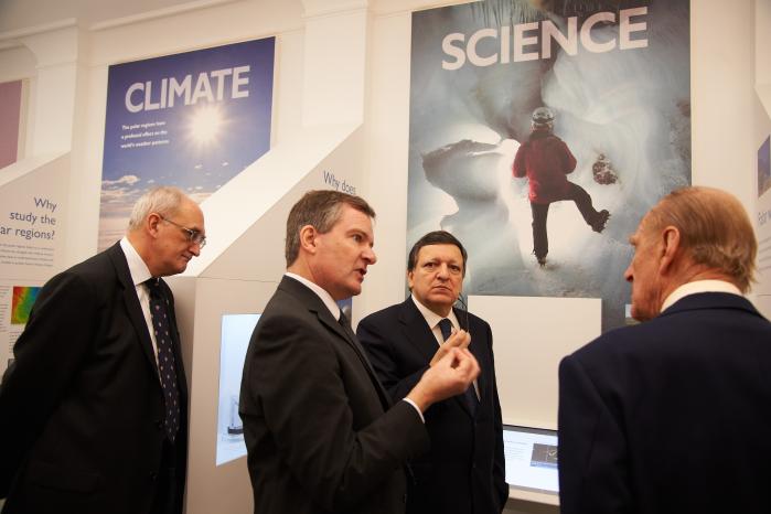 SPRI research projected through the Museum. EC President Barroso and HRH
      the Duke of Edinburgh hear about ice and climate change from Dowdeswell.
      Right: a member of SPRI's `Cool Club' holds up a model he has made of
      Antarctica's bedrock after learning about ice-penetrating radar.
