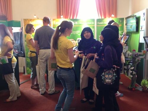 A Chemistry Department volunteer engaging with school students at the RSSE