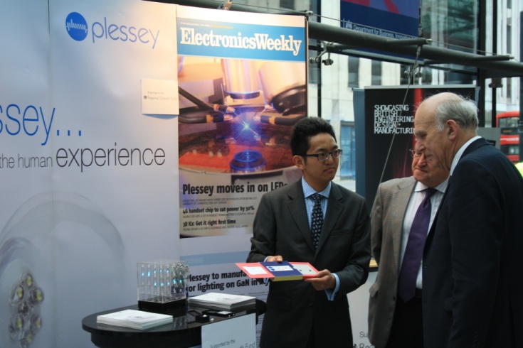Fig. 1. Vince Cable, Secretary of State for Business, Innovation
      and Skills, visits Plessey (15 April 2013) and hears about the
      GaN-on-silicon technology from Lewis Liu.