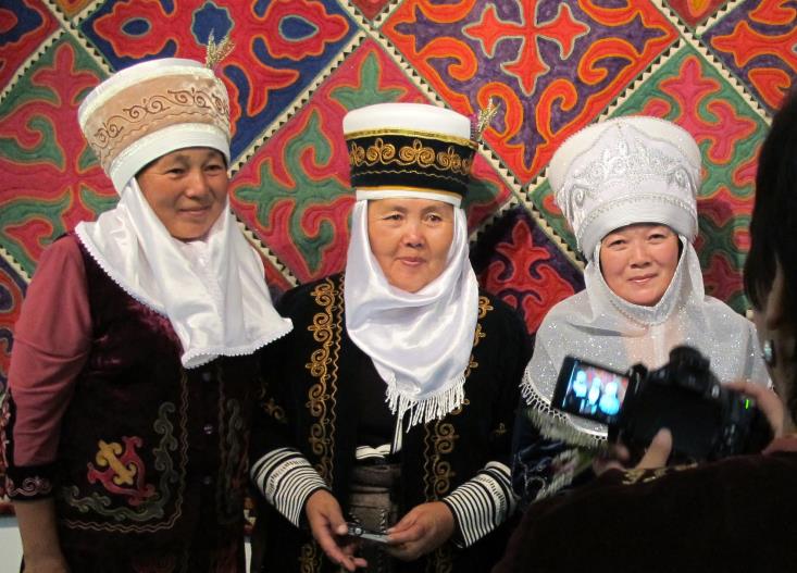 Three of the 12 Kyrgyz artists who visited the UK at the
      opening of the From Quilts to Couture exhibition in 2011.